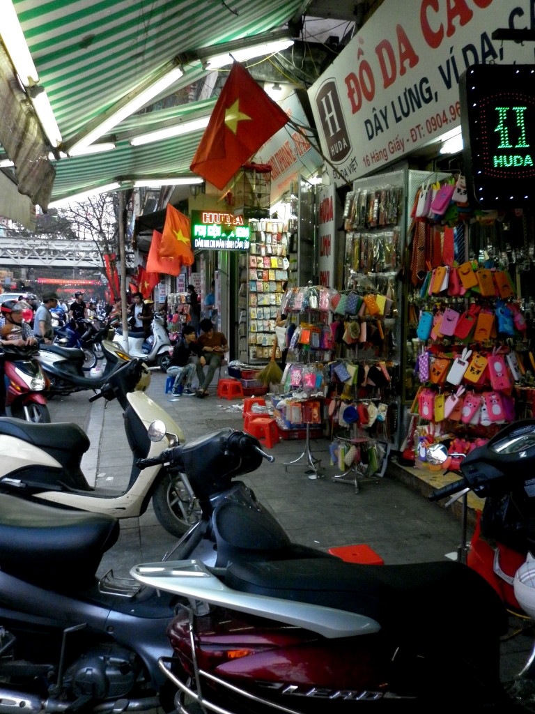 Storefronts selling over 100 different flavors of iPhone covers on Hang Giay in Hanoi.  