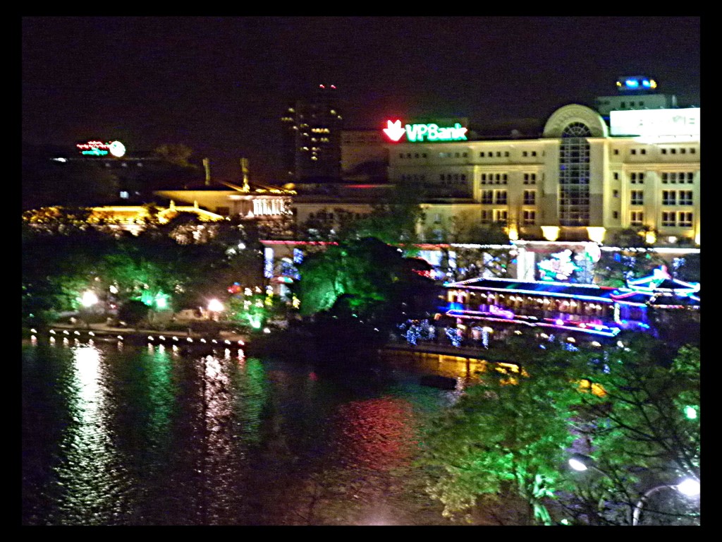 The view of Northern banks of Hoan Kiem Lake.  Not so dissimilar to the flashing neon lights of my hometown of Reno.